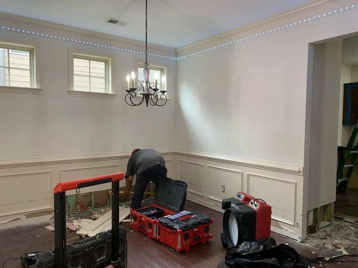 Restoration technician with professional equipment in Mounds View